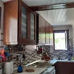 דירה ξυλοπετρα / Wood & Stone House טסגרדה